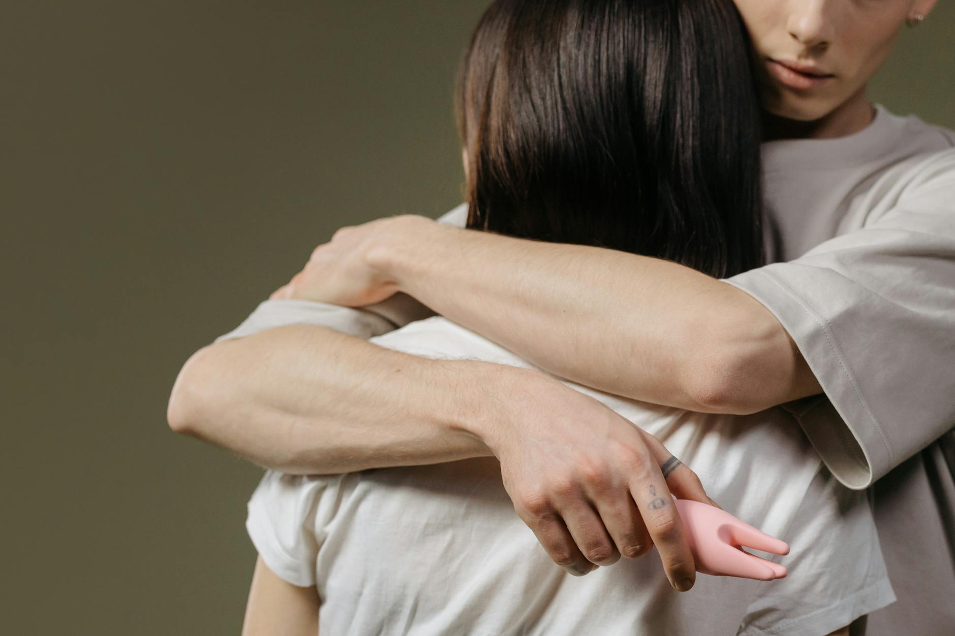 Close-up of a couple embracing, showing physical intimacy and renewed connection